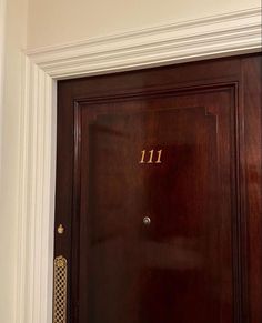 a wooden door with the number 11 on it