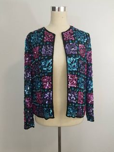 "Gorgeous beaded and Sequined Vintage jacket!! Beautiful checkered design throughout. Great Vintage Condition Photographed on a size 4 dress form.  1 hook and eye closure Measurements: Length: 22\" Bust: 34\" Sleeve Length: 24\" Shoulder to Shoulder: 15\"" Fitted Multicolor Sequined Outerwear, Fall Multicolor Beaded Outerwear, Checkered Design, Womens Jackets, Dress Form, Vintage Jacket, Art Collection, Bathing Beauties, Size 4