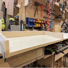 a workbench with many different tools on it