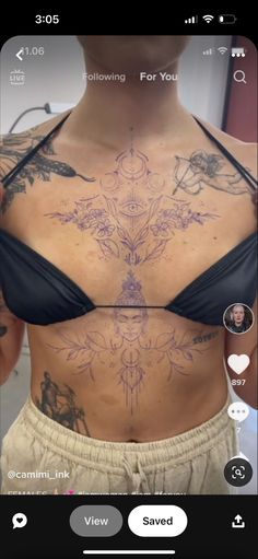 a woman with tattoos on her stomach and chest is shown in an instagramtion photo