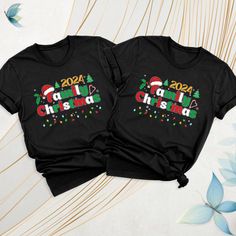 2024 Christmas Family Matching Shirt, Custom Xmas Family Tshirt, Holiday Group Tee, Christmas Family Party Tee, Family Christmas Crew tee Celebrate Christmas 2024 in style with our Family Christmas Shirts! Perfect for holiday gatherings, Christmas parties, or just cozying up by the tree. Custom Xmas Family Tshirts make the ideal Christmas gift for women, and your family. Whether you're shopping for a fun family photo, a festive Christmas crew outfit, or a unique holiday gift, our Family Christma Black Christmas T-shirt With Short Sleeves, Black Short Sleeve Christmas T-shirt, New Year Black Crew Neck T-shirt, Black Crew Neck T-shirt For New Year, Festive Black T-shirt With Letter Print, Black Short Sleeve T-shirt For Festive Occasions, Festive Crew Neck T-shirt For New Year, Christmas Family Party, Family Tshirt