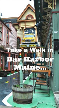 there is a sign that says take a walk in the bar harbor marine on this street