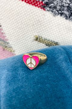 Details: Add the perfect finishing touch to any outfit with this heart shape peace sign ring. - Heart shape - Peace sign design Content: Lead compliant Size + Fit: one size Peace Sign Design, Peace Sign Ring, Ring Heart, Hair Accessories Gift, Blowout Sale, Love Ring, Sneaker Heels, Peace Sign, Beauty Shop