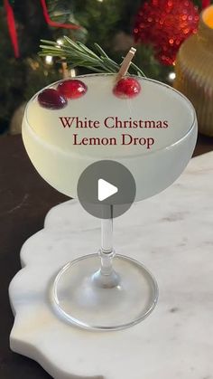 a white christmas lemon drop cocktail on a table