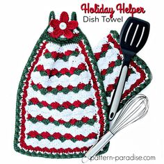 a crocheted dish towel and spatula on a white background with the words holiday helper dish towel written below it