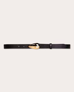 Named for its bean-shaped buckle, this Black Suede Studio belt is detailed 18-karat gold hardware. The buffed leather design features eight holes for adjustable comfort.Bean buckleEight holesBelt: 100% leatherBuckle: 18k gold-plated base metalSpot cleanImported Size & Fit Width: 1in Fits true to size Size S (denim sizes 24-26): 32in long from buckle to middle hole Size M (denim sizes 26-28): 34in long from buckle to middle hole Size L (denim sizes 28-30): 36.5in long from buckle to middle hole Black And Gold Belt, Gold Belt, Gold Belts, Leather Design, Black Belt, Black And Gold, Leather Belt, Black Suede, Gold Hardware