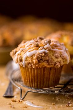 a muffin sitting on top of a cooling rack