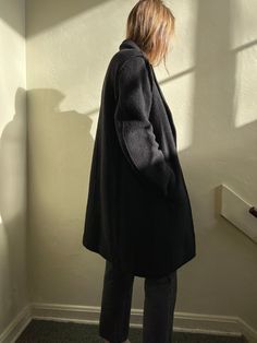 Beautiful 90s boiled wool coat. Stunning structure with a unique outer seam detail. Very warm.  Fits up to medium. Measurements: Long Casual Wool Outerwear, Cozy Wool Outerwear With Pockets, Cozy Wool Sweater Coat For Winter, Winter Cashmere Pea Coat With Long Sleeves, Fitted Long Sweater Coat For Cold Weather, Oversized Wool Blazer For Winter, Oversized Cashmere Wool Coat For Winter, Black Cashmere Wool Coat For Winter, Black Cashmere Wool Coat For Fall