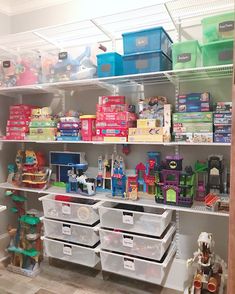 the shelves are filled with toys and other items