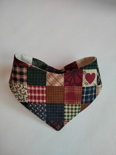 a dog bandana made out of patchwork material