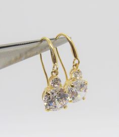 Vintage 14K Solid Yellow Gold White Topaz Hook Earrings....Marked 14K...Total of weights 1.3gr...Measure H 5/8'' W 2/8''...These are in very good condition. Anniversary Cubic Zirconia Earrings With Bail, Classic Gold Diamond Earrings With Bail, Gold Round Diamond Earrings With Bail, Silver Eye, Topaz Engagement Ring, Evil Eye Ring, Engagement Ring Sizes, Drop Dangle Earrings, Unisex Ring