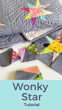 the wonky star quilt pattern is shown on top of some pieces of fabric, with text overlay that reads wonky star