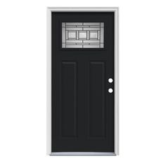 a black front door with glass panels