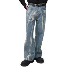 Make a statement with our Bleached Lightning Wide-Leg Jeans. These eye-catching denim pants feature a unique bleached pattern resembling streaks of lightning against a classic blue jean backdrop. The wide-leg silhouette offers a comfortable, relaxed fit with a trendy 90s-inspired look. Perfect for fashion-forward individuals, these jeans combine vintage aesthetics with modern style. Ideal for casual outings or creating a bold street-style ensemble that's sure to turn heads. Grunge Acid Wash Wide Leg Bottoms, Trendy Bleached Straight Leg Bottoms, Faded Distressed Pants For Spring, Faded Distressed Spring Pants, Baggy Acid Wash Distressed Bottoms, Acid Wash Baggy Straight Leg Pants, Baggy Acid Wash Straight Leg Pants, Fall Bleached Cotton Bottoms, Casual Bleached Wide-leg Bottoms