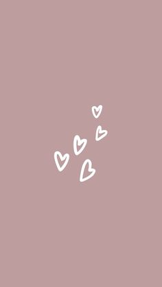 hearts drawn in white on a pink background