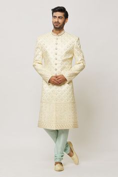 Gold sherwani embroidered with diamond patterns, embellished by crystals and sequin. Comes with a churidar. - Aza Fashions Semi-stitched Sherwani With Mirror Work For Wedding, Bollywood Style Semi-stitched Sherwani With Mirror Work, Traditional Drape Sherwani With Mirror Work For Wedding, Wedding Sherwani With Mirror Work, Wedding And Festival Sherwani With Mirror Work, Bollywood Style Kundan Sherwani For Eid, Wedding Sherwani With Mirror Work For Eid, Wedding Sherwani With Mirror Work For Diwali, Eid Wedding Sherwani With Mirror Work