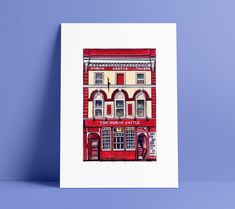 a red and white building on a blue background