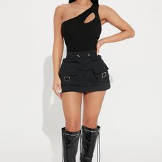 Black Cargo Mini Skirt With Adjustable Waist Band Cargo Skirt Rave Outfit, Edgy Black Skort, Edgy Fitted Black Cargo Skirt, Chic Black Cargo Skirt For Night Out, Fitted Black Edgy Cargo Skirt, Edgy Mini Cargo Skirt For Night Out, Fitted Black Mini Cargo Skirt, Edgy Black Fitted Cargo Skirt, Edgy Black Cargo Skirt For Spring