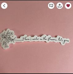 there is no flower, it's grown sticker on the pink background with text