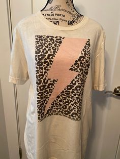 Cream T-Shirt with pink leopard print lightening bolt. Sublimation design. Size Large Cream T Shirt, Pink Leopard Print, Pink Leopard, Design Color, Sublimation Design, Bella Canvas, Leopard Print, Color Design, Adult Outfits