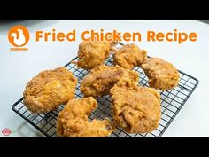 fried chicken recipe on a cooling rack with the words, fried chicken recipe above it