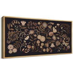 a black and gold wall hanging with flowers on it