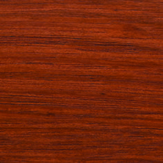 a close up view of the wood grains on this table top, which looks like it has been stained red