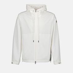 • Round collar
 • Long sleeves
 • Straight cut
 • Double slider zip closure
 • Moncler logo in felt on the sleeve
 • Elastic edges
 • Fixed, adjustable hood with drawstring
 • Slit side pockets
 • Solid color
 • Made of nylon
 • Several colors available Moncler Logo, Luxury Outerwear, Moncler Jacket, Polo Jeans, Fashion Deals, White Jacket, Dress Trousers, T-shirt Polos, Windbreaker Jacket