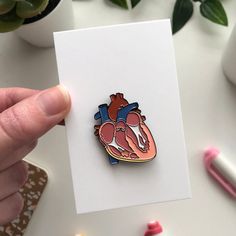 This vibrant Anatomy Heart Organ Brooch is the perfect addition to any style. Crafted from zinc alloy and enamel with a heart-shaped pattern, it's perfect for doctors, nurses, and medical students alike. Wear it as a lapel, backpack, or badge and feel the connection to healthcare professionals of today. Gift it to someone special and show the world your Trendy style! Organ Jewelry, Gifts For Medical Students, Anatomy Heart, Heart Organ, Medical Pins, Gift For Doctor, Bling Ideas, Medical Student Gift, Birthday Cards For Boyfriend