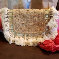 Beautiful Clutch Natural Color With Small Details Of Seashells Bohemian Embellished Bags For Vacation, Bohemian Embellished Bag For Vacation, Bohemian Woven Party Bag, Beach Embellished Rectangular Shoulder Bag, Rectangular Embellished Beach Shoulder Bag, Beach Rectangular Embellished Shoulder Bag, Embellished Rectangular Shoulder Bag For Beach, Bohemian Beige Shoulder Bag For Party, Pom Pom Clutch