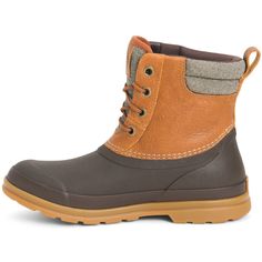 Muck Women's Originals Duck Lace Waterproof Duty Boot - Tan/Dk Brown - ODLW-902 On Sale Now! This Item Ships FREE! Inspired by our iconic Chore Boot, Muck Originals is a collection of light duty, yet essential footwear built for everyday use. The Leather Originals feature a durable rubber shell with a full-grain waterproof leather upper, and hand-laid rubber for flexibility, comfortable, 100% waterproof protection. Molded PU footbeds with a layer of memory-foam offer maximum underfoot comfort. F Womens Muck Boots, Flat Shoe, Muck Boots, Ll Bean Boot, Synthetic Rubber, Lace Up Heels, Leather Care, Lace Boots, Wellington