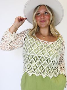 With a delicate crochet design and a flattering U-neck, it's a timeless piece for any occasion. It is perfect for partnering with a colored tank underneath, adding dimension to any look. Embrace effortless charm with this versatile wardrobe staple that can also double as a swimsuit coverup top. Chic Summer Crochet Lace Top, Lace Tops With Crochet Trim For Layering, Feminine Cotton Lace Top For Spring, Summer Lace Top For Layering, Feminine Fitted Open Knit Crochet Top, Spring Chic Crochet Lace Top, Spring Lace Crochet Top, Feminine Fitted Crochet Top With Pointelle Knit, Crochet Lace Top For Layering