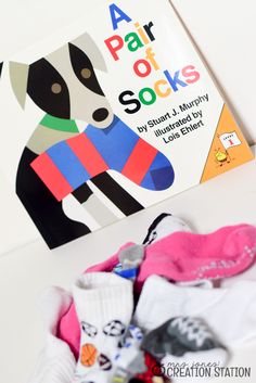 there is a book about socks on the table