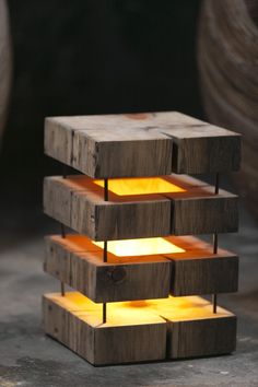 a light that is made out of wood and has some lights on top of it