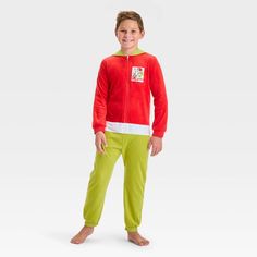 Get your kid ready for holiday fun in Grinch-like style with The Grinch Union Suit. This long-sleeve union suit features a red upper, white waist and green bottom for an eye-catching look. Made from midweight fabric, this hooded union suit helps keep them warm and comfortable. Plus, with its front half-length zipper, it's easy to wear and remove. Red Playful Winter Onesie, Playful Red Winter Onesie, White Long Sleeve Onesie For Holiday, Red Long Sleeve Onesie, Casual Long Sleeve Christmas Onesie, Holiday Long Sleeve Onesie, Red Long Sleeve Onesie For Loungewear, Long Sleeve Holiday Onesie, White Long Sleeve Christmas Onesie