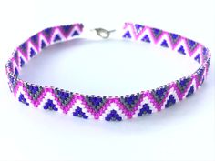 This anklet features: -Silver Lined Fuchsia Miyuki Delica Seed Beads  -Silver Lined Violet Miyuki Delica Seed Beads  -Chalk White Miyuki Delica Seed Beads  -Gunmetal Miyuki Delica Seed Beads -Fireline Bead String  -12mm Lobster Clasp and Eyelet -9 1/4 inches in length  Please contact me if you have any questions. Thank You for visiting! Bracelets last longer with minimal exposure to water. Handmade Purple Anklets As Gift, Handmade Pink Anklets As Gift, Adjustable Purple Anklets As Gift, Weave Bracelet, Stitch Bracelet, Bracelet Miyuki, Huichol Art, Miyuki Bracelet, Antique Brass Metal