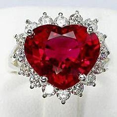 METAL SPECIFICATIONS White Gold 14K STONE SPECIFICATIONS Stone Name: Ruby & Diamond Stone Cut : Heart and Round Stone Specifications: There is one red ruby in the center of approx. 10.00 carats and approx. 0.75 carats smaller diamonds on the side. Natural earth mined stones. Color : Red/F Clarity : AAA/VS1 Total : Approx. 10.75 carats RING SPECIFICATIONS Appraised Value : $2500 0.00 Ring Size : 6.5 (Can ship in any size you want) Comes with Certificate White Gold Ruby Ring, Heart Shaped Engagement Rings, Brian Froud, Silver Jewelry Accessories, Ruby Diamond Ring, Ruby Ring Gold, Ruby Diamond Rings, Diamond Jewelry Designs, Purple Love