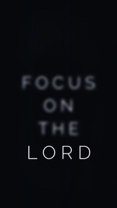 the words focus on the lord written in black and white with an image of a cross