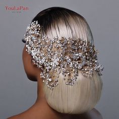 the back of a woman's head wearing a bridal hair comb