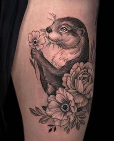 an animal with flowers on it's thigh