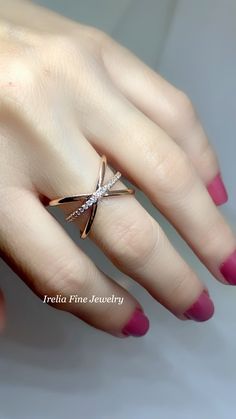 Beautiful 14k Rose Gold Diamond Criss Cross Ring , it has a total of 1/6 in Natural Diamonds lined in the center. Diamonds are trapped measuring 1.30 mm to 1.20 mm , with a total of 21 , Diamond Color is H+ This ring is ready and available in size 7 14k Rose Gold Jewelry With Vvs Clarity, Crisscross Ring, Elegant Cross Rings With Diamond Accents, Criss Cross Ring Designs, Diamond Cross Rings For Gifts, X Rings Criss Cross, Diamond Finger Ring, Hand Jewelry Rings, Fancy Diamond Ring