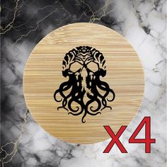 an octopus on a wooden plate with the number four in front of it and another image behind it