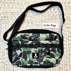 A Bathing Ape Bape Camo Crossbody Laptop Bag With Keychain Brand New, No Tag, Unworn Seal In Package Size: 14” (W) X 10.5” (H) X 2” (D) Internal Pocket X 2 Units Outside Pocket X 1 Unit Original From Japan 100% Authentic Bape X Japanese Magazine Collaborate Product Material: Polyester Ship In 24 Hours Final Sale Green Bag With Adjustable Strap For Streetwear, Streetwear Rectangular Shoulder Bag With Adjustable Strap, Rectangular Shoulder Bag With Adjustable Strap For Streetwear, Green Rectangular Streetwear Bag, Bag With Keychain, Designer Laptop Bag, Bape Camo, Bottega Bag, Crossbody Laptop Bag