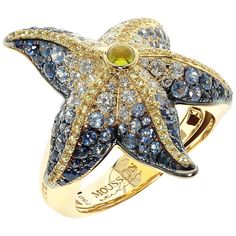 Diamonds Sapphire 18 Karat Yellow Gold Sea Star Ring Dream on Sunny Sea Holidays? With this Sea Star Ring all the colours of the reef will be always with you. Check the graduation of the colours, and how the shape of the Sea Star fit the finger Accompanied with the earrings LU116415242361 Please request a video link to check this ring in action US Size 7 1/4 EU Size 54 5/8 23x28mm (WxL) 9.27gm Sapphire Cocktail Ring, Sea Life Jewelry, Contemporary Jewelry Design, Buying Gold, The Reef, Crystal Jewelry Sets, Contemporary Ring, Diamond Jewelry Designs, Diamond Quartz