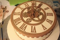 there is a cake that looks like it has gears in the center and numbers on the side