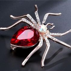 New! Large Spider Crystal Brooch Pin With Rhinestone Accents. Red Crystal Stone Body. Approx 2.19" X 2.09". New To Poshmark? Save $10 On Your First Purchase When You Sign Up For An Account With The Invite Code: Freshfit Style Tags# Lapel Jacket Bag Pin, Hat Pin, Sparkly Shiny Halloween Costume Cosplay Accent Accessory Cheryl Blossom Riverdale Umbrella Academy The Handler Widowmaker Goth Gothic Punk Big Red Brooches For Valentine's Day, Red Brooch Jewelry For Valentine's Day, Red Valentine's Day Brooch, Red Rhinestone Brooch For Gift, Red Rhinestone Brooches For Gifts, Women Brooch, Rhinestone Spider, Spider Brooch, Spider Queen