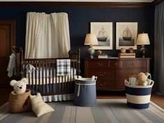 a baby's room with blue walls and striped rugs