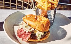 a plate with a sandwich and fries on it