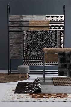 a collection of rugs and chairs in various colors