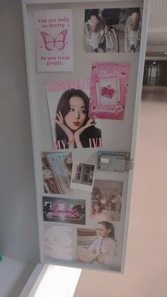 a refrigerator with magnets and pictures on it